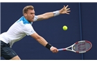 EASTBOURNE, ENGLAND - JUNE 14: Daniel Smethurst of Great Britain plays a backhand against Joe Salisbury of Great Britain during their Men's Singles qualifying match on day one of the Aegon International at Devonshire Park on June 14, 2014 in Eastbourne, England.  (Photo by Steve Bardens/Getty Images)